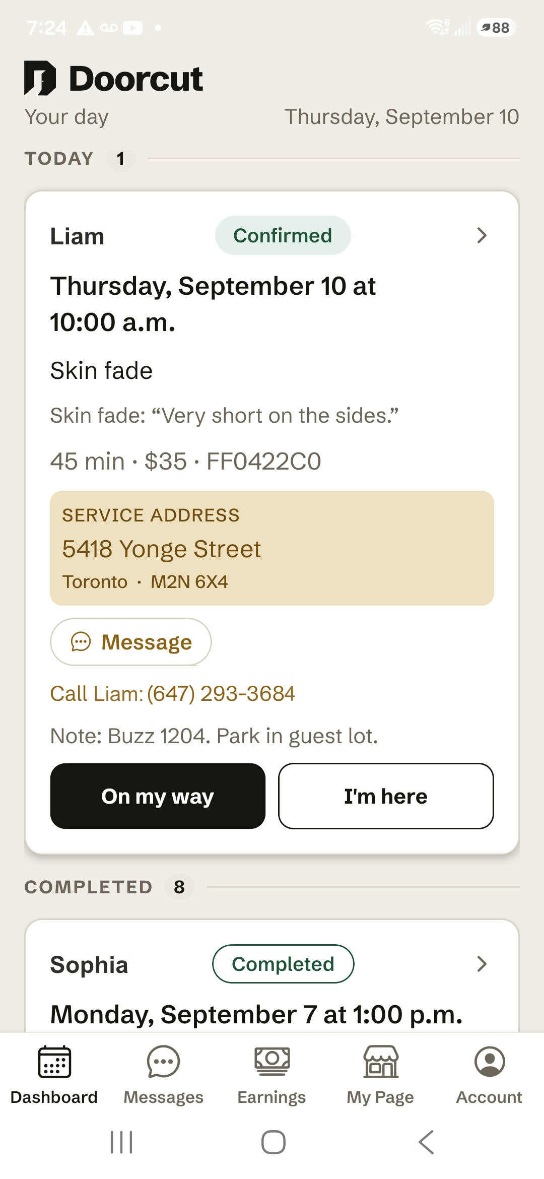 A booking in the Doorcut app on the day, showing the on-the-way and arrived steps a provider marks as they go.